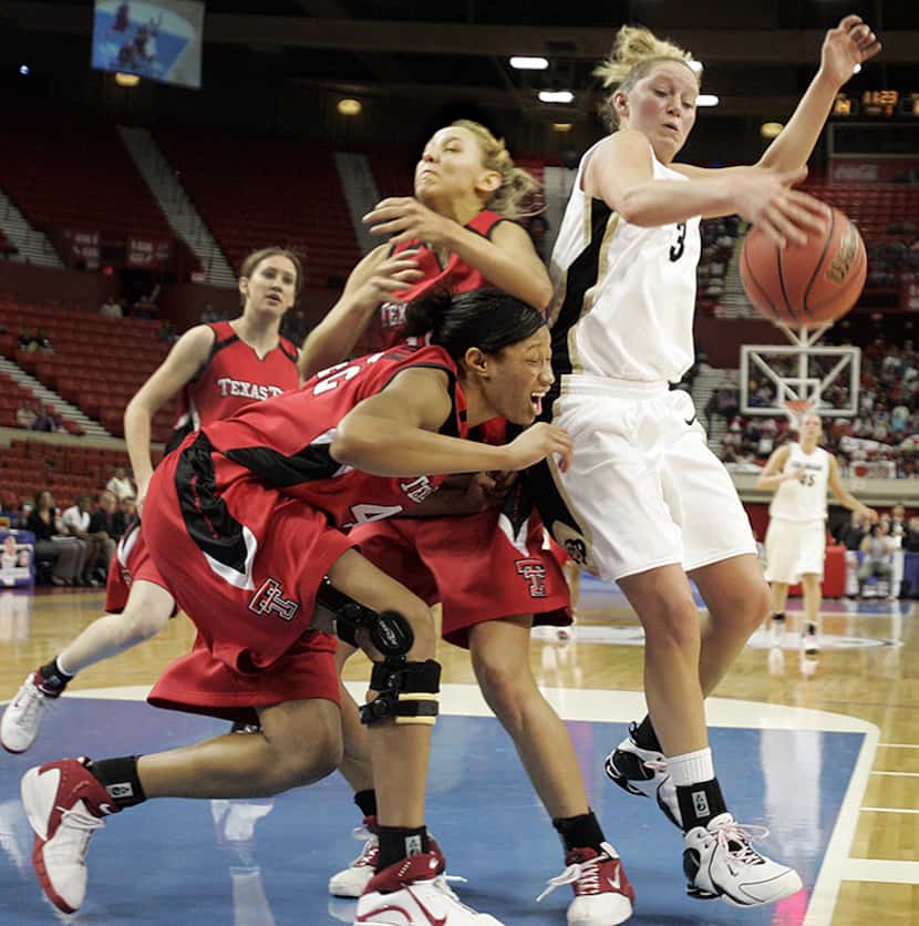  March 6,Â 2007 -- Texas Tech's Brooke Baughman (10) colllides with teammate Darrice Griffin...