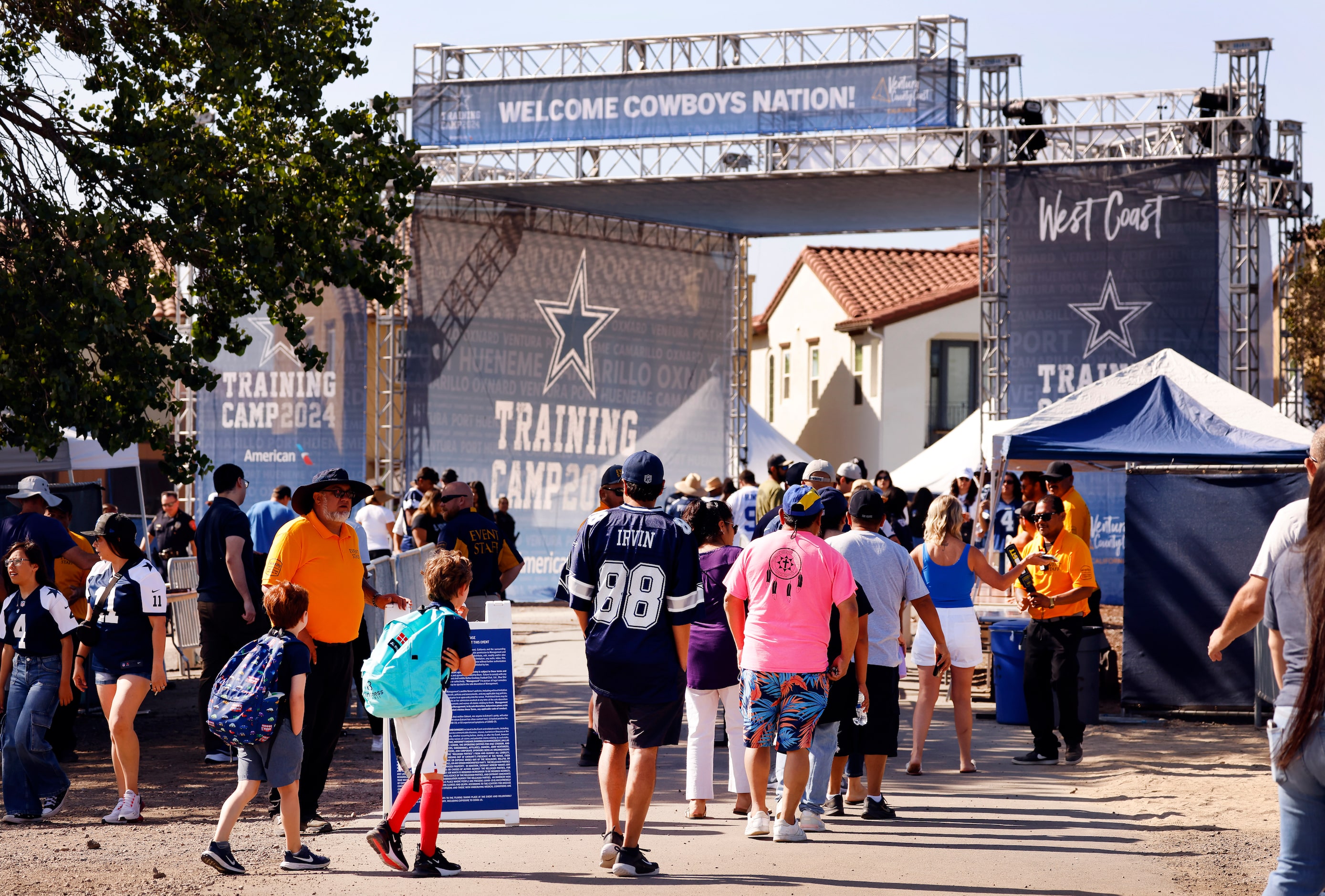 Dallas Cowboys fans arrive for a training camp practice in Oxnard, California, July 27,...