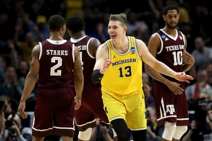 LOS ANGELES, CA - MARCH 22:  Moritz Wagner #13 of the Michigan Wolverines celebrates after...