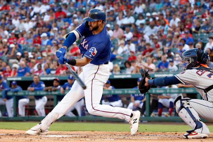 Texas Rangers center fielder Joey Gallo (13) strokes a double against the Houston Astros...
