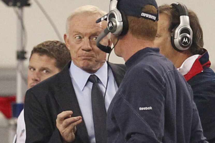 Dallas owner Jerry Jones talks with Dallas Cowboys head coach Jason Garrett after Tony Romo...