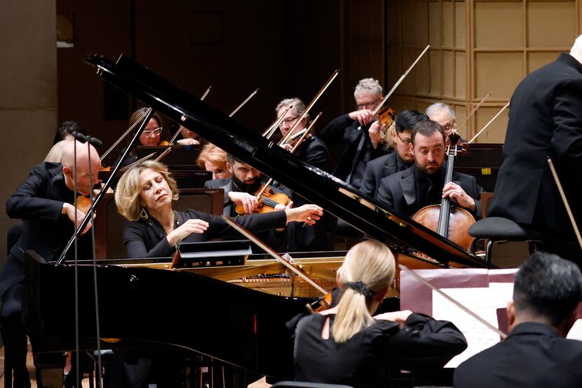 Edo de Waart (right) conducted as pianist Ingrid Fliter (left) and the Dallas Symphony...