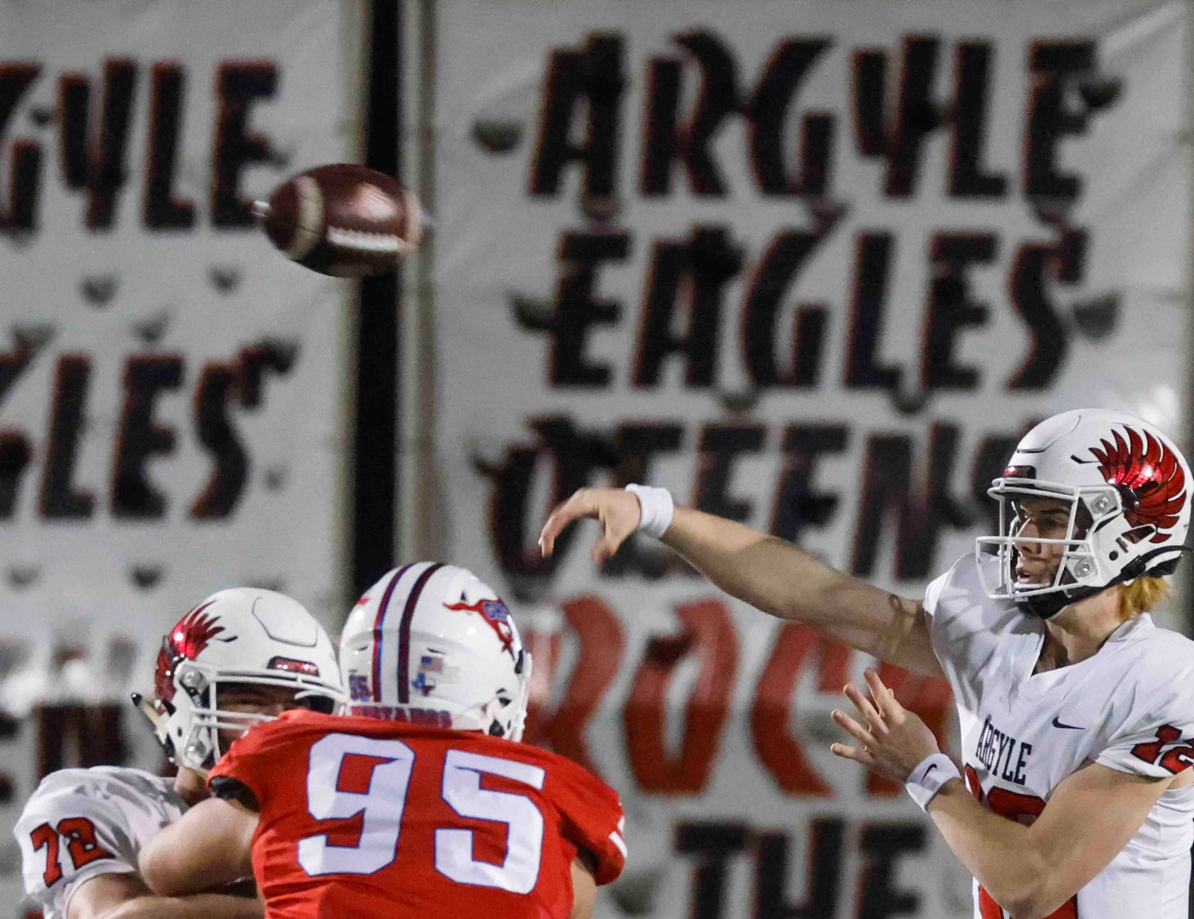 Argyle high’s QB John Gailey (12) throws the ball against Grapevine high during the first...