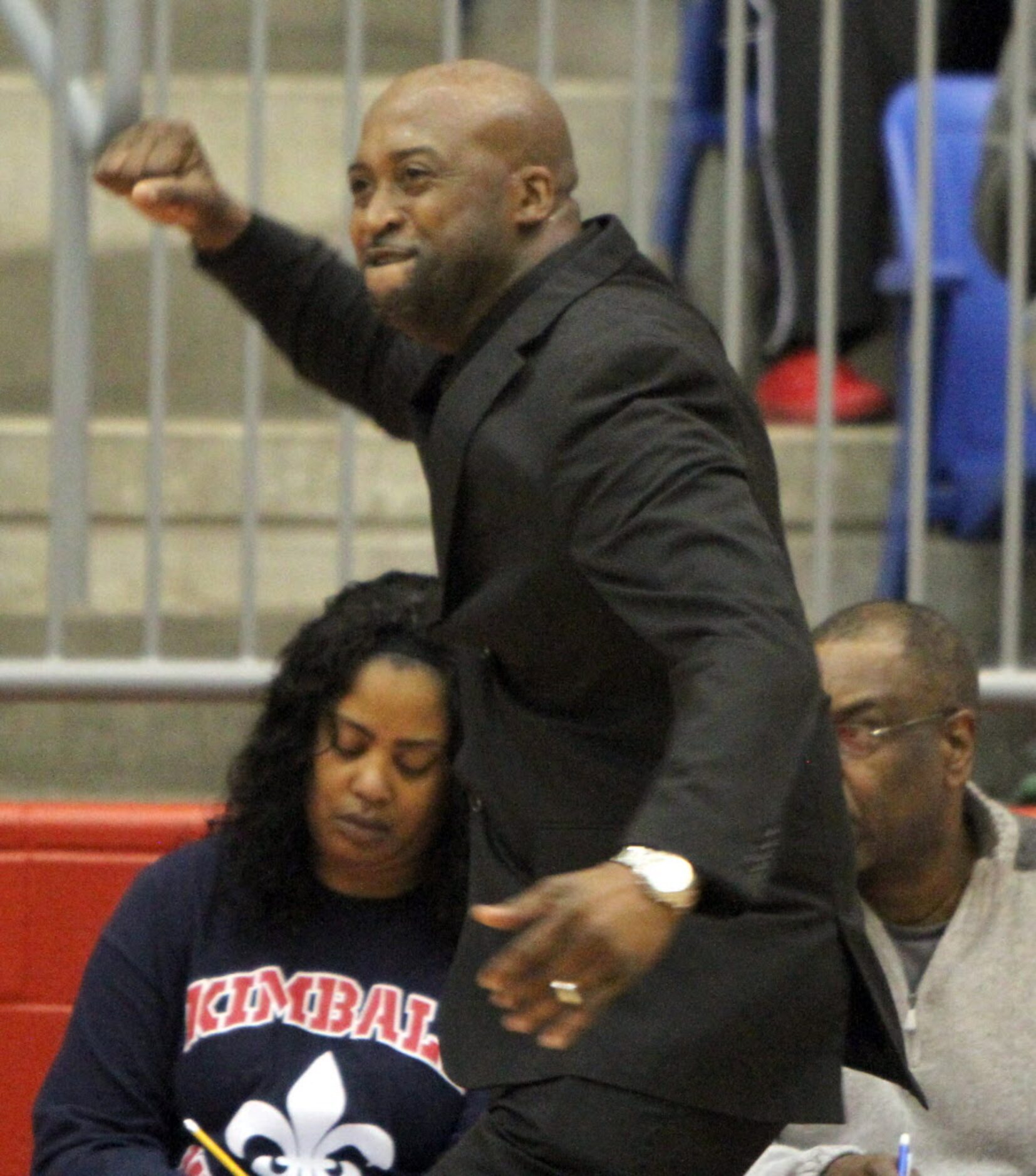 Dallas Kimball head coach Nick Smith reacts with enthusiasm as his team erased a deficit to...