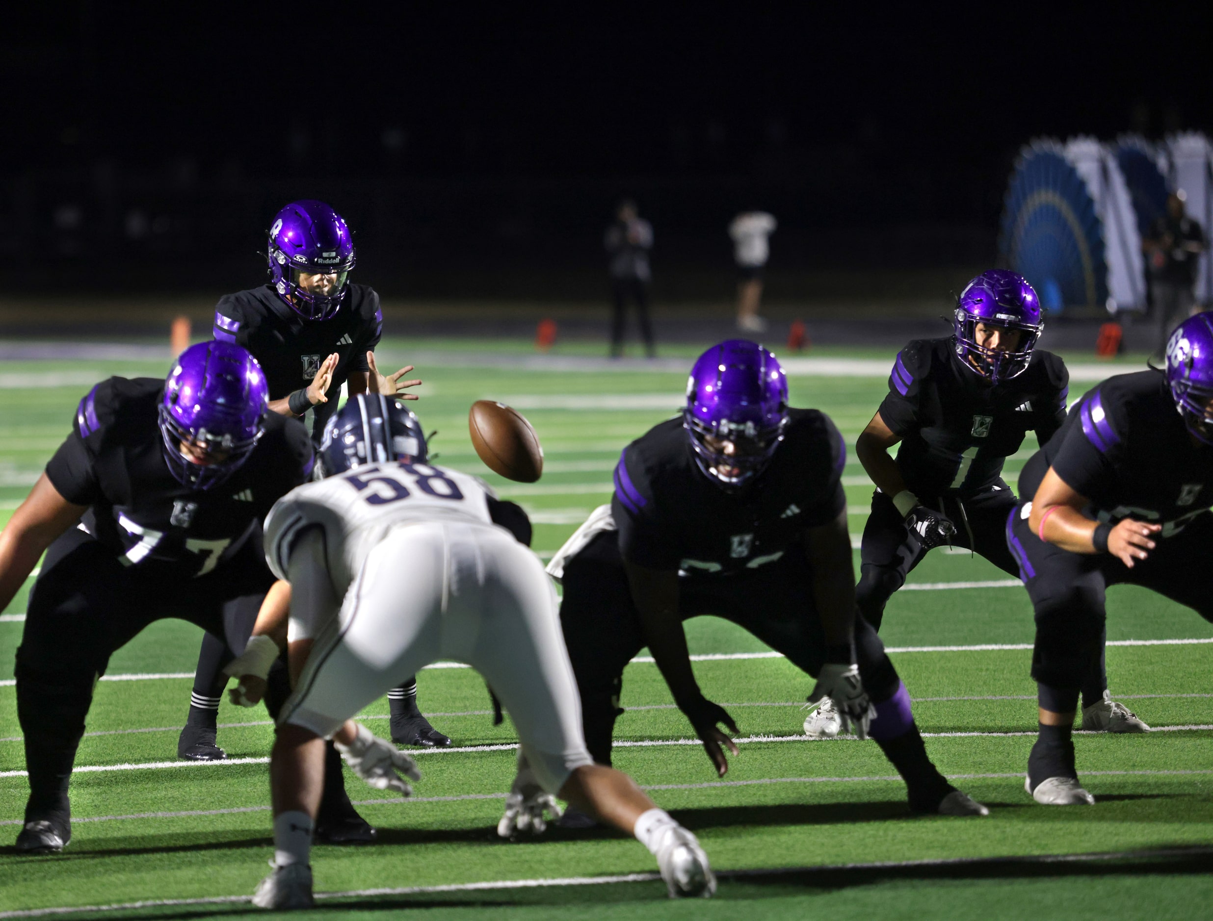 Anna player #8 Ziondre Williams receives the snap during the Prosper Walnut Grove High...