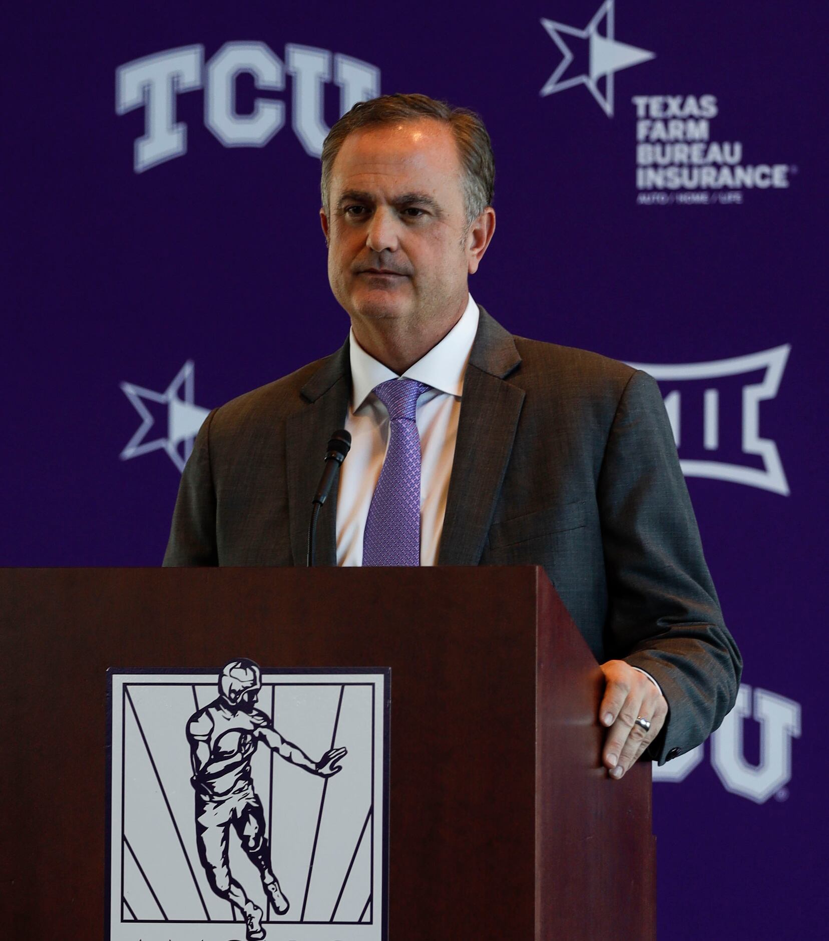 Texas Christian University's head football coach, Sonny Dykes, speaks at a news conference...