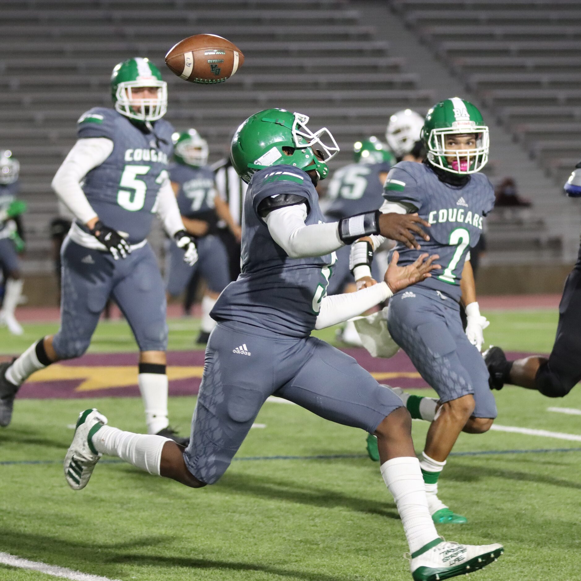 Bryan Adams running back Antoine Murphy (5) fumbles the toss from quarterback Jordan Smith...