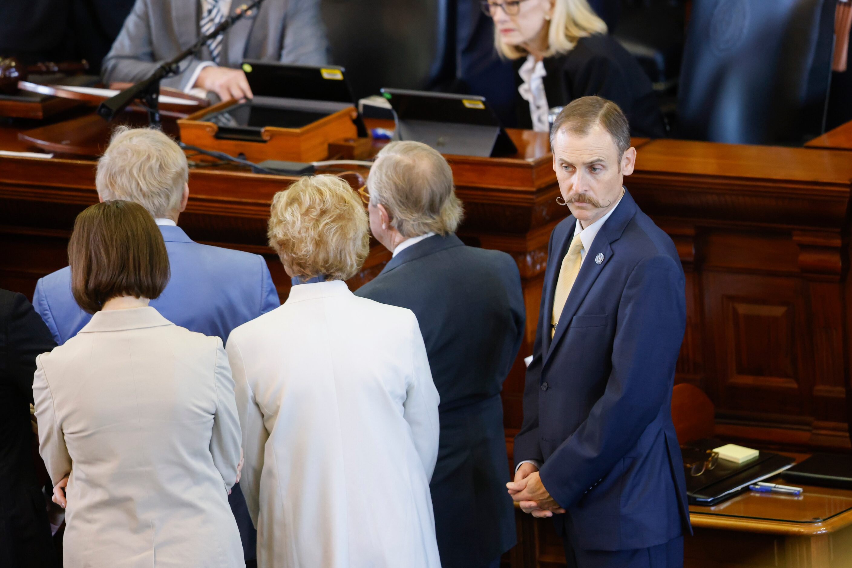 Andrew Murr, R-Junction, the head of the House impeachment managers, stands at the dais at...