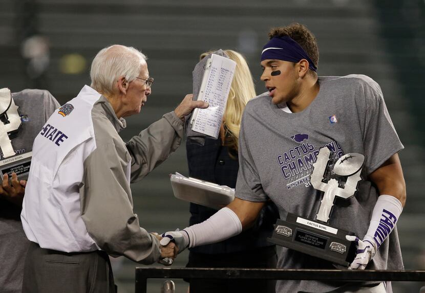 Kansas State head coach Bill Snyder and defensive back Denzel Goolsby are pictured after the...