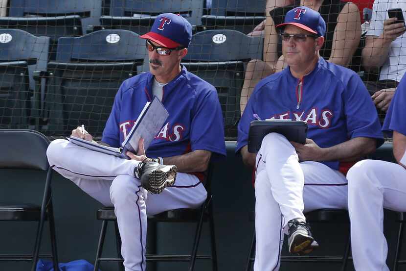 Texas pitching coach Mike Maddux, left, and his brother, hall-of-fame hurler Greg Maddux,...