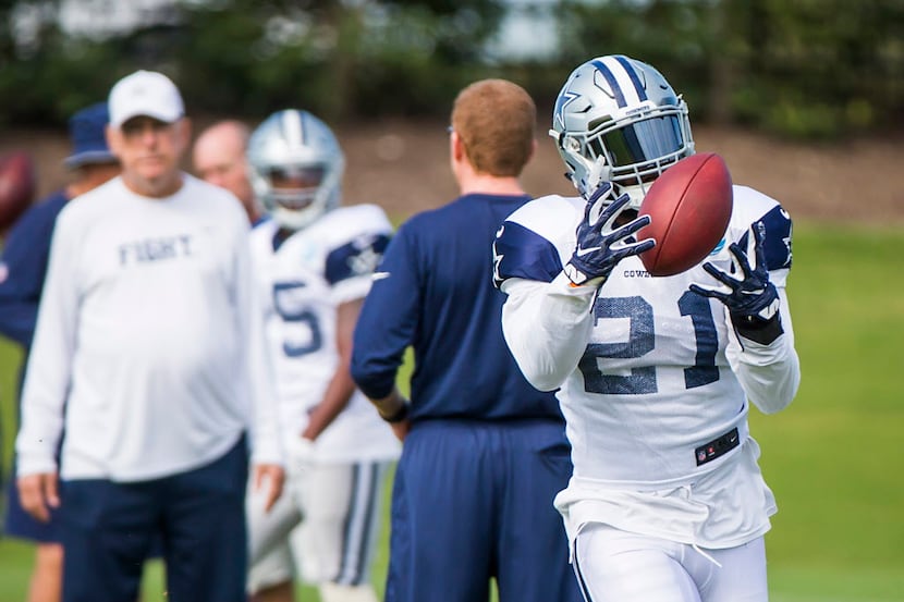 Dallas Cowboys running back Ezekiel Elliott catches a pass during the team's practice at The...