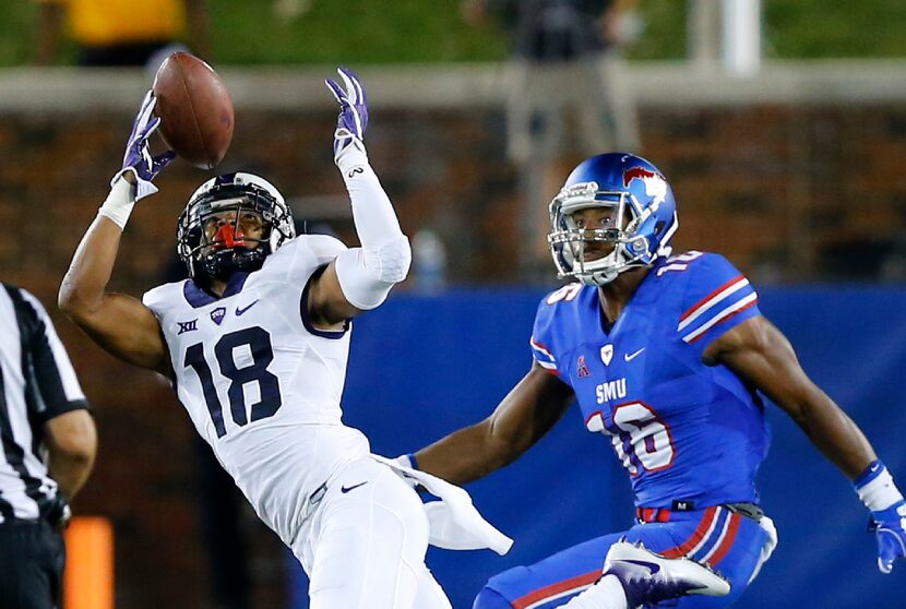 FILE - TCU Horned Frogs safety Nick Orr (18) almost come with an interception on a pass...