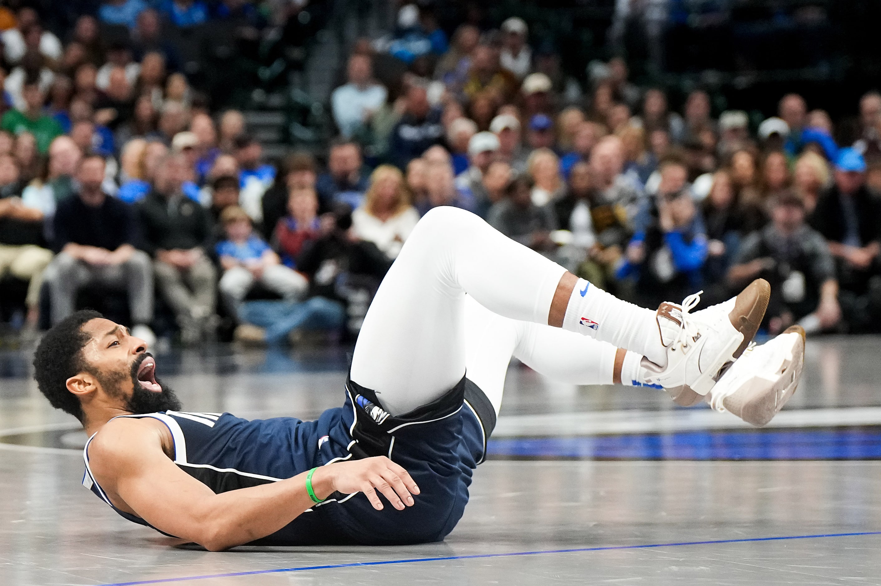 Dallas Mavericks guard Spencer Dinwiddie reacts after missing a 3-point attempt during the...