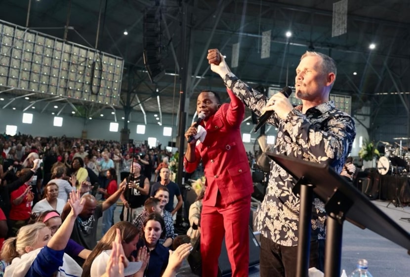 Apostle Bible Davids (left) with Pastor Greg Locke at the June "Dallas Mass Deliverance"...