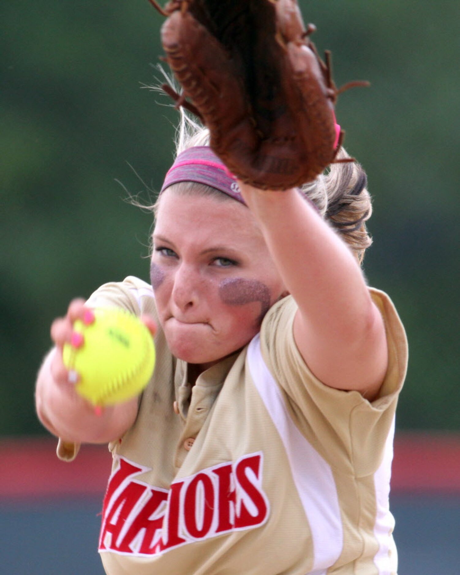 South Grand Prairie pitcher Haltom Shepherd (21) prepares to pitch to a Denton Guyer batter...