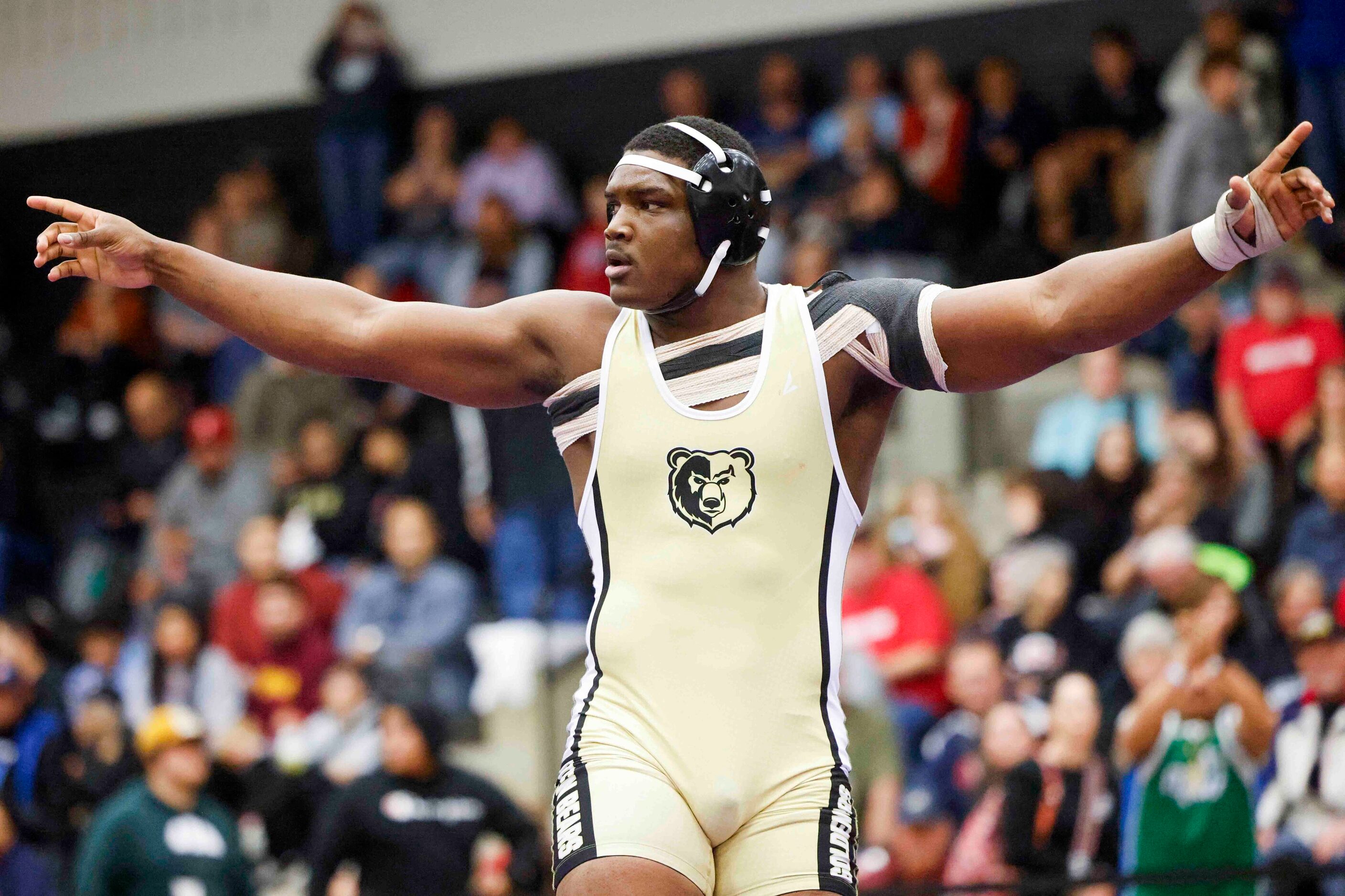 Markeist Wright of Dallas South Oak Cliff cheers over his win against Anthony Fulmer of...