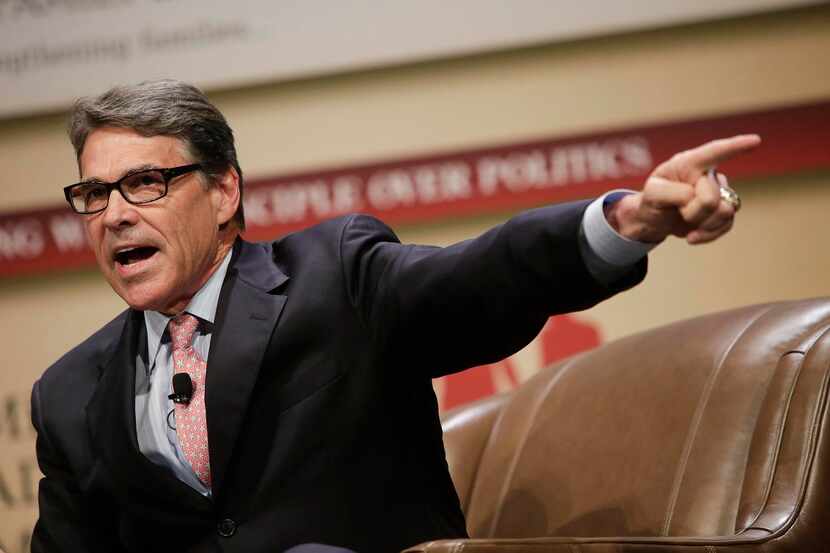 
Attorneys for former Gov. Rick Perry — seen at last week’s Family Leadership Summit in...