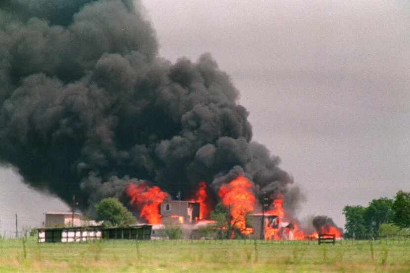 In an April 20, 1993 file photo, flames engulf the Branch Davidian compound in Waco, Texas. 