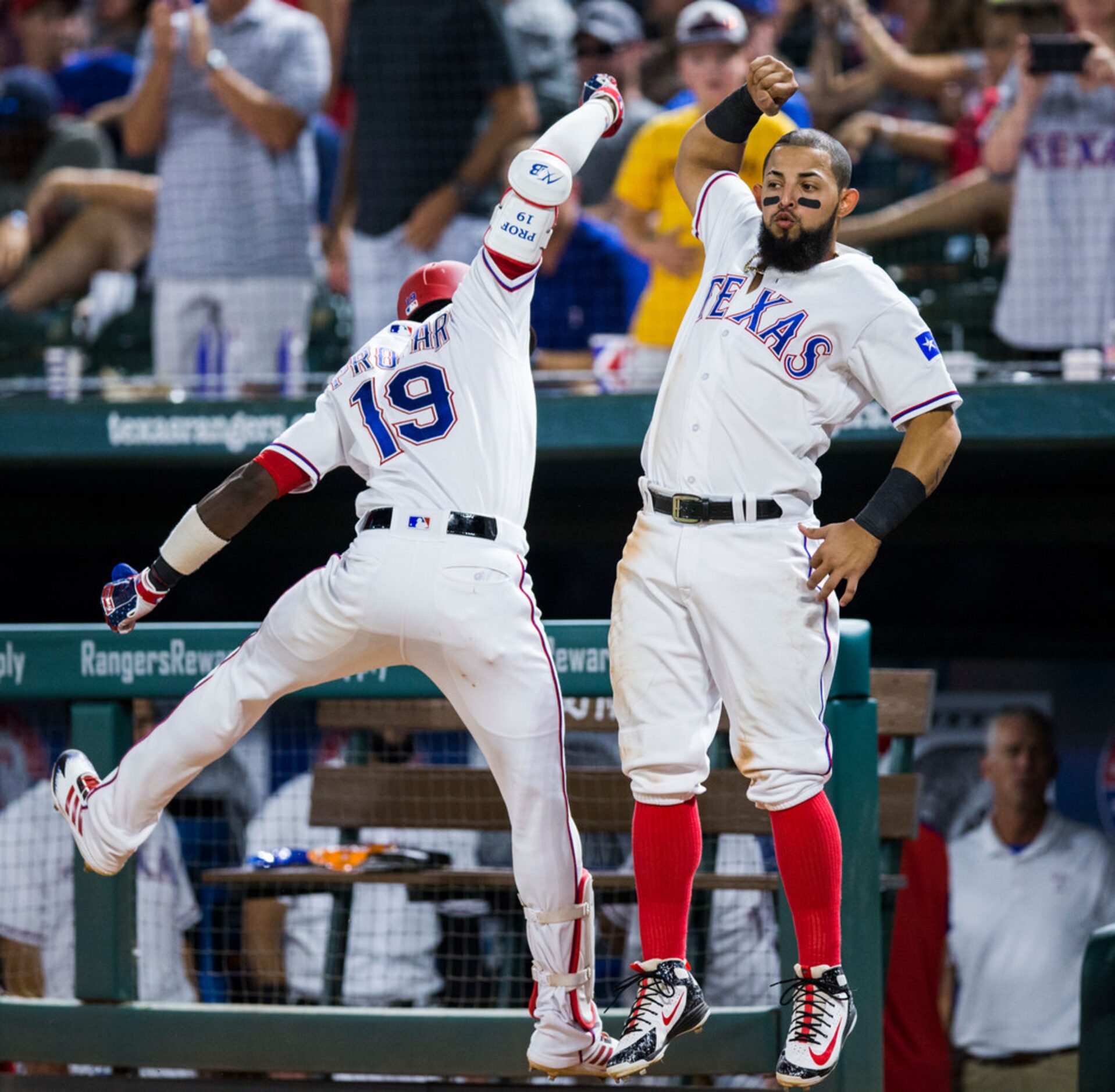 Texas Rangers shortstop Jurickson Profar (19) celebrates a home run with second baseman...