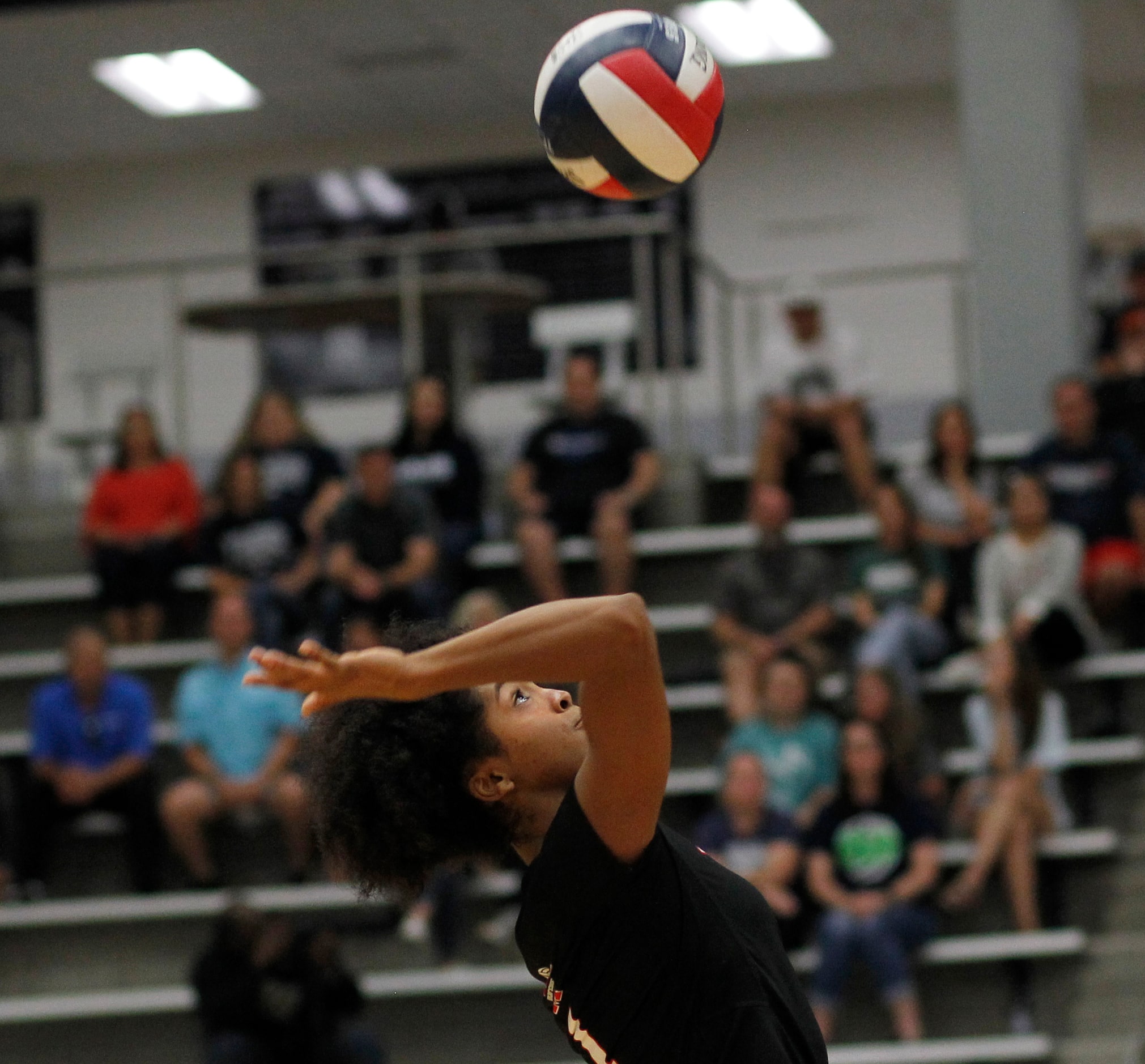 Flower Mound Marcus' Madison Dyer (1) focuses before making a return during the opening set...