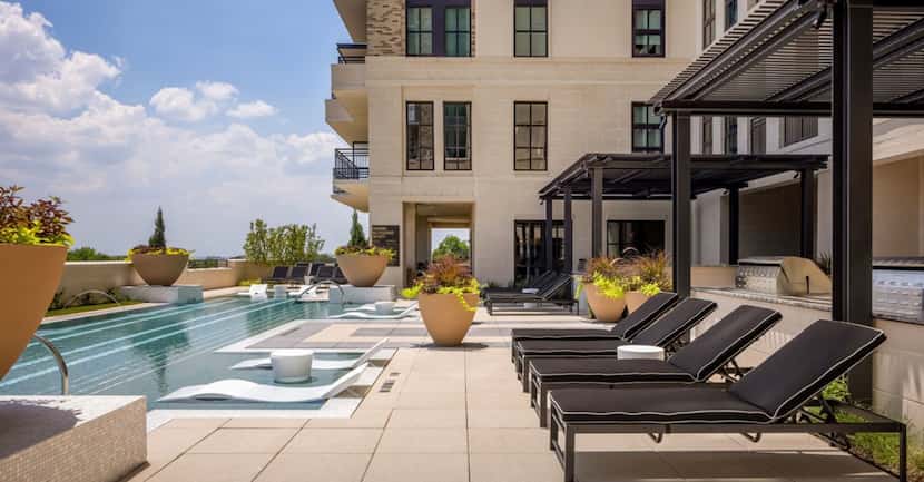 The 20-story Novel Turtle Creek apartment tower in Oak Lawn has a pool deck overlooking the...