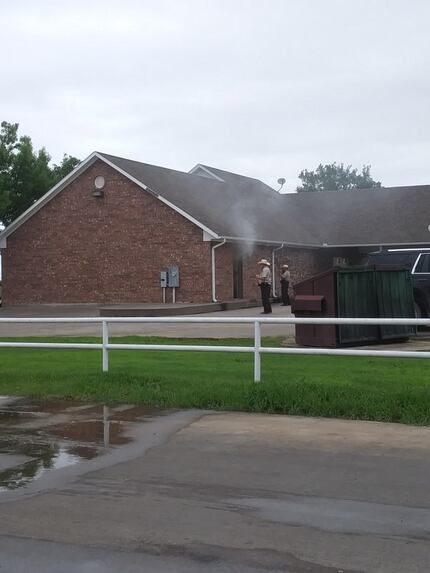 Smoke errupts from the doors of the Enloe State Bank On May 11, 2019. (Courtesy of Teresa...