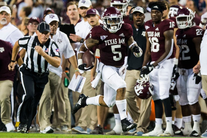 Texas A&M Aggies running back Trayveon Williams (5) runs down the sideline during the second...