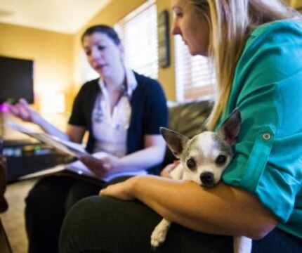  Amber Weiss talks with veterinarian Joanna Harchut about hospice care for her Chihuahua...