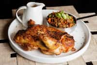 Flat iron chicken served with dirty rice shows owner Dee Lincoln's Louisiana roots. Her new...