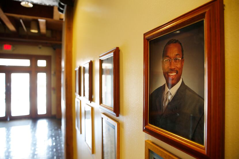 A photograph of Dallas County Commissioner John Wiley Price hangs on the first floor of his...