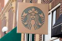 Starbucks sign hangs outside a casino along Main Street Wednesday, Sept. 20, 2023, in...