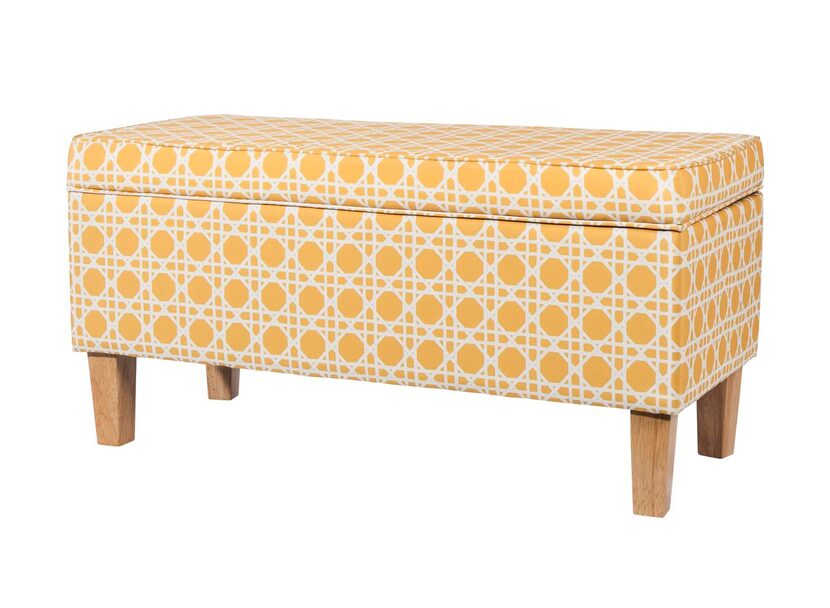 
A cushy job: This bright yellow, upholstered bench has a secret. Hidden beneath its...