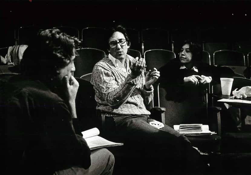 Adrian Hall meets with actors during a rehearsal in 1983.