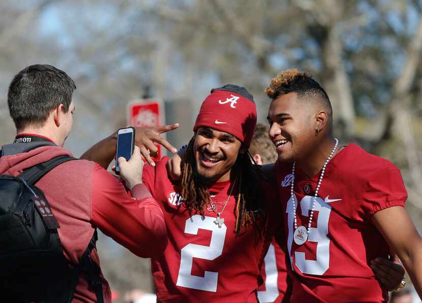 Alabama quarterbacks Jalen Hurts, left, and Tua Tagovailoa have their picture taken during...