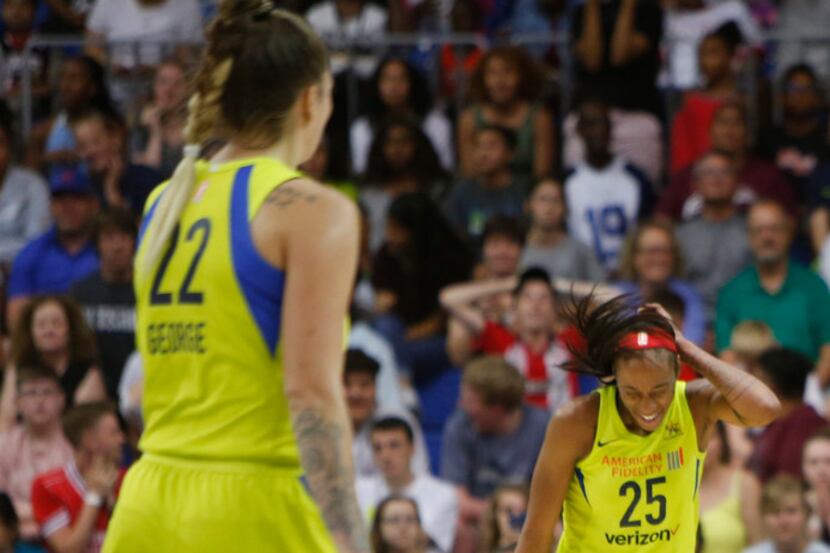 Dallas Wings forward Glory Johnson (25) reacts after missing a critical shot during the...
