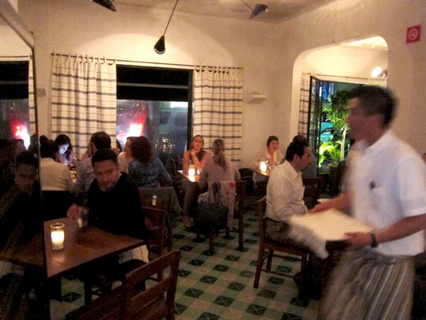 The tiny dining room at Maximo Bistrot in the Colonia Roma neighborhood of Mexico City...