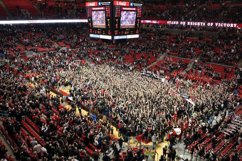 Feb 17, 2016; Lubbock, TX, USA; The Texas Tech Red Raiders student body storms the court...