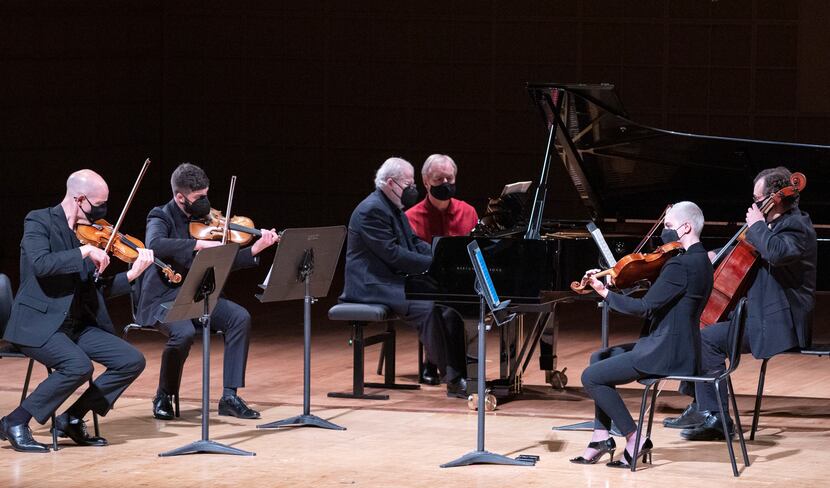 Pianist and Dallas Symphony Orchestra artist in residence Emanuel Ax, with musicians from...