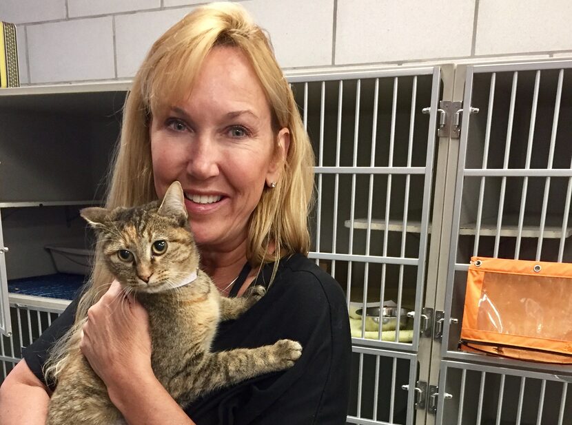 Molly DeVoss with Isabella, who was adopted shortly after this photo was taken Saturday.