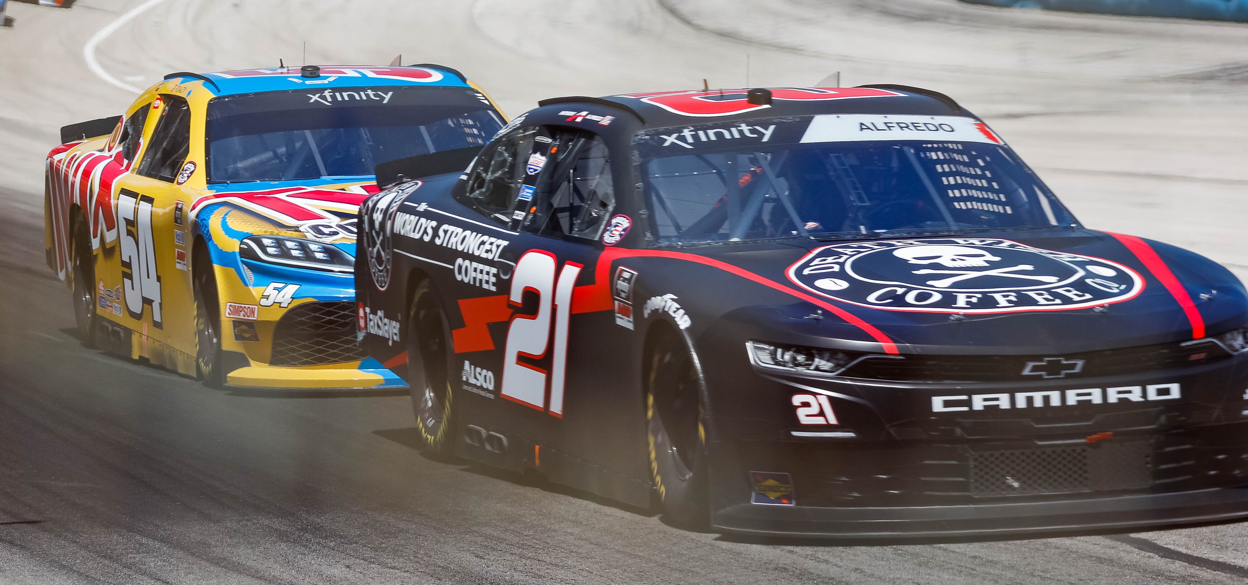 NASCAR Xfinity's Kyle BuschÕs (No. 54) trails Anthony Alfredo (No. 21) during the My...