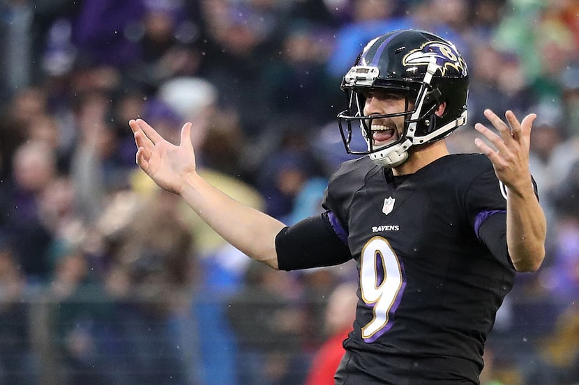 BALTIMORE, MD - DECEMBER 18: Kicker Justin Tucker #9 of the Baltimore Ravens celebrates...