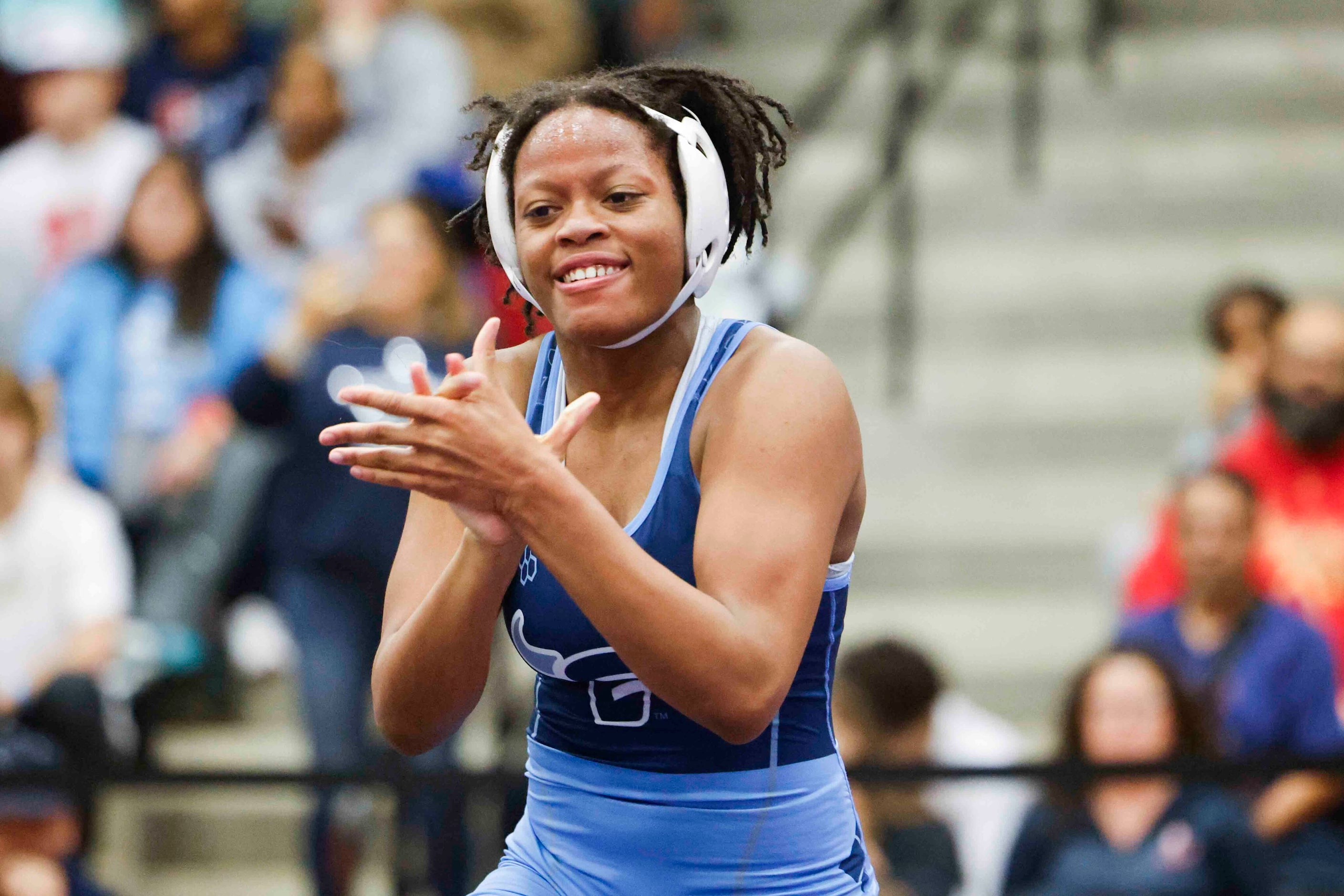 Summer Rodgers of Frisco Emerson cheer after defeating Mackenzee Bunton during 5A Region II...