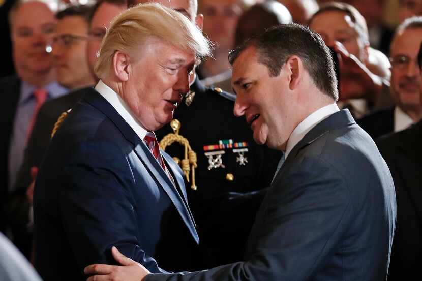 President Donald Trump speaks with Sen. Ted Cruz in the East Room at the White House on June...