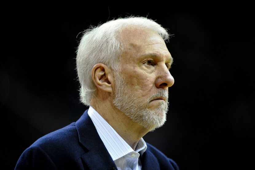 Jan 30, 2016; Cleveland, OH, USA; San Antonio Spurs head coach Gregg Popovich reacts in the...
