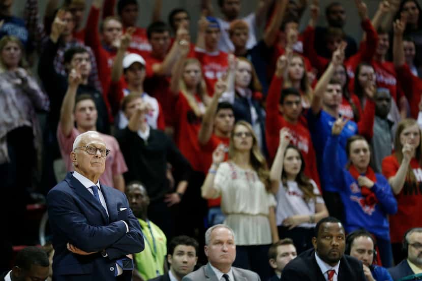 SMU head coach Larry Brown watches a player shoot free throws in the second half during an...