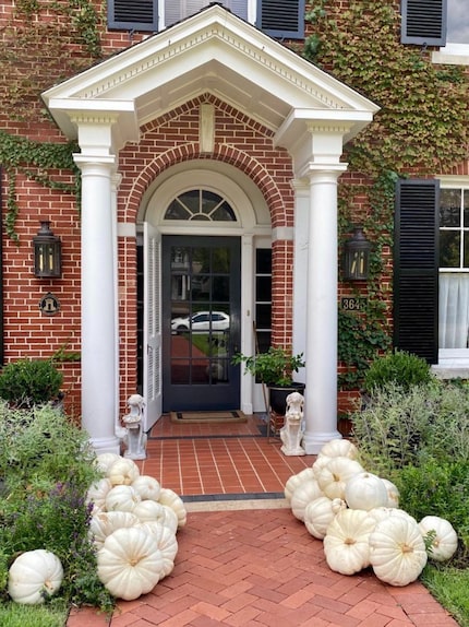 White pumpkins on porch