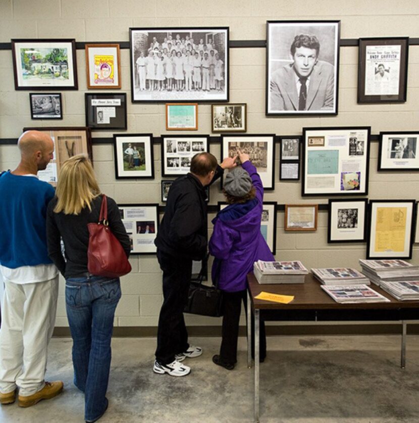 Visitors look at exhibits in the Andy Griffith Museum in Mount Airy, N.C. Mount Airy served...