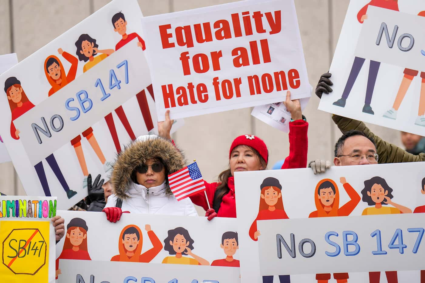 Demonstrators rally in opposition to Texas Senate Bill
147 on Sunday, Jan. 29, 2023, in...