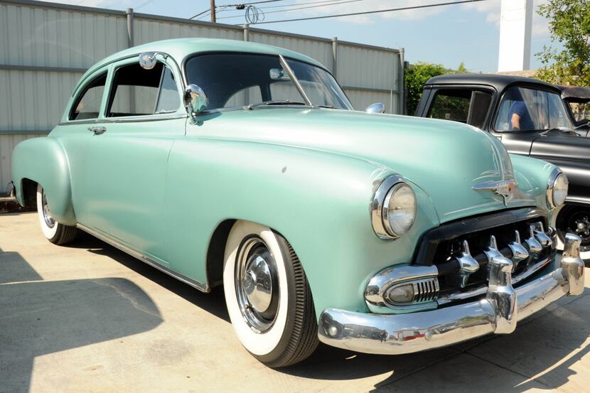 This split window Chevrolet Bel Air with custom pin-striping is on display at the custom car...
