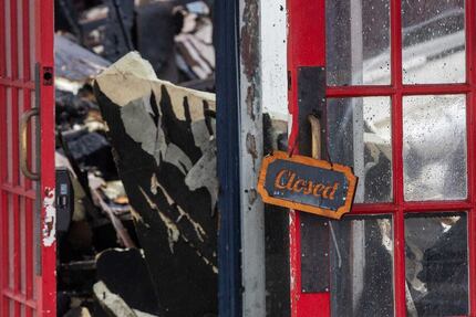 The "closed" sign at Texas French Bread in Austin hangs ominously after a fire destroyed...